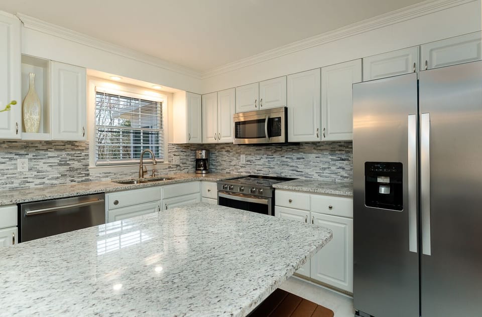Kitchen featuring a wifi smart range