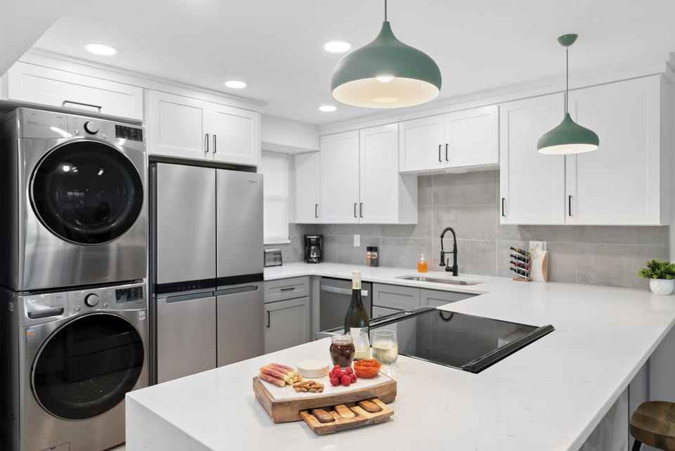 Stylish kitchen with high-end appliances, and a convenient in-unit washer and dryer.
