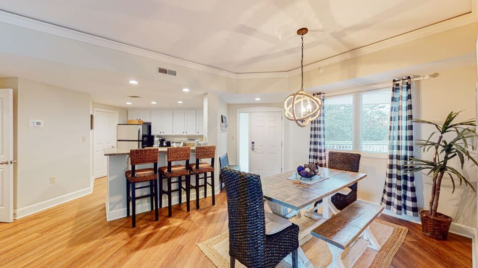 Open Floor Plan Dining Room with Kitchen Views and Counter Seati
