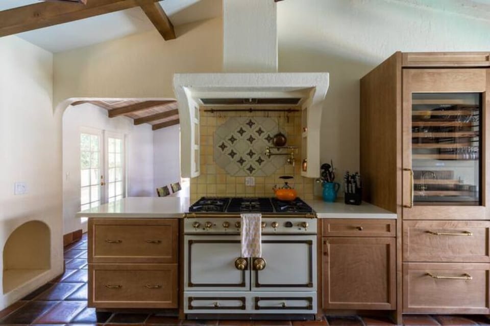 La Cornue gourmet stove, subzero multi-zone wine fridge seen here.