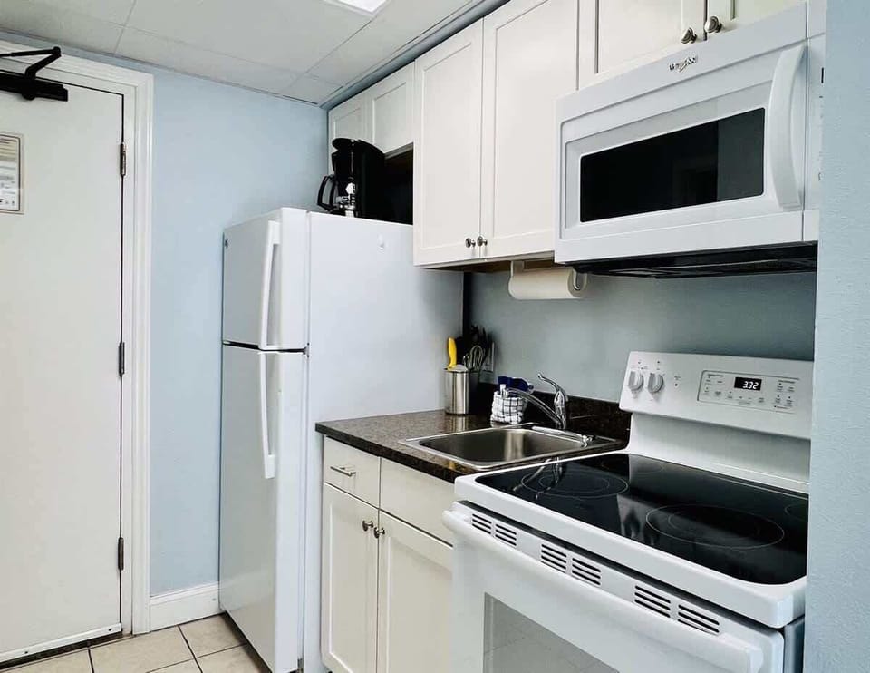 A modern kitchen that lets you cook like you never left home.

