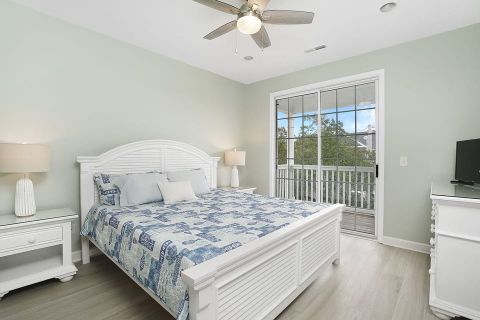 Drift off to peaceful dreams in your coastal-inspired bedroom, where soft sea breezes flow through French doors to your private balcony.