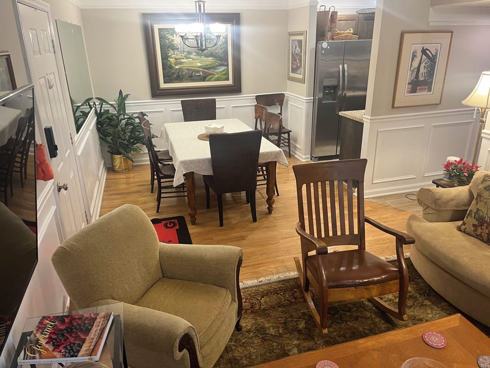 Living room features a 58” Roku TV, board games, great books & seating up to 8