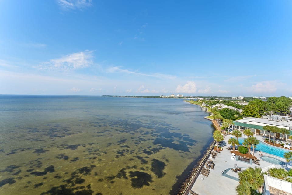Choctawhatchee Bay and pool at Bayside Inn on the resort.