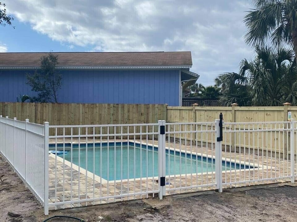 Heated pool shared with three townhomes 