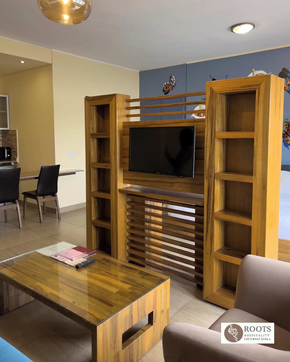 Superior Room | Living area | 32-inch LCD TV with cable channels, TV
