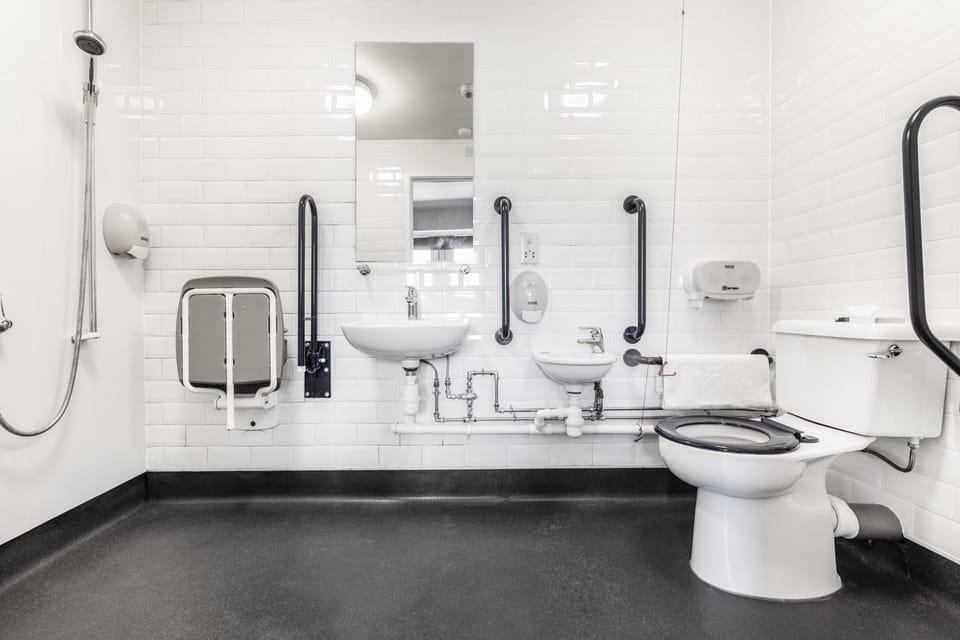 Shower, towels, toilet paper