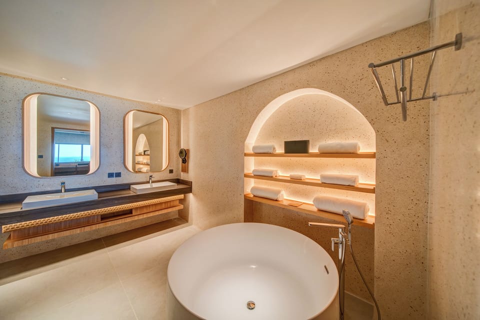 Executive Suite, 1 King Bed, Ocean View | Bathroom | Shower, rainfall showerhead, free toiletries, hair dryer