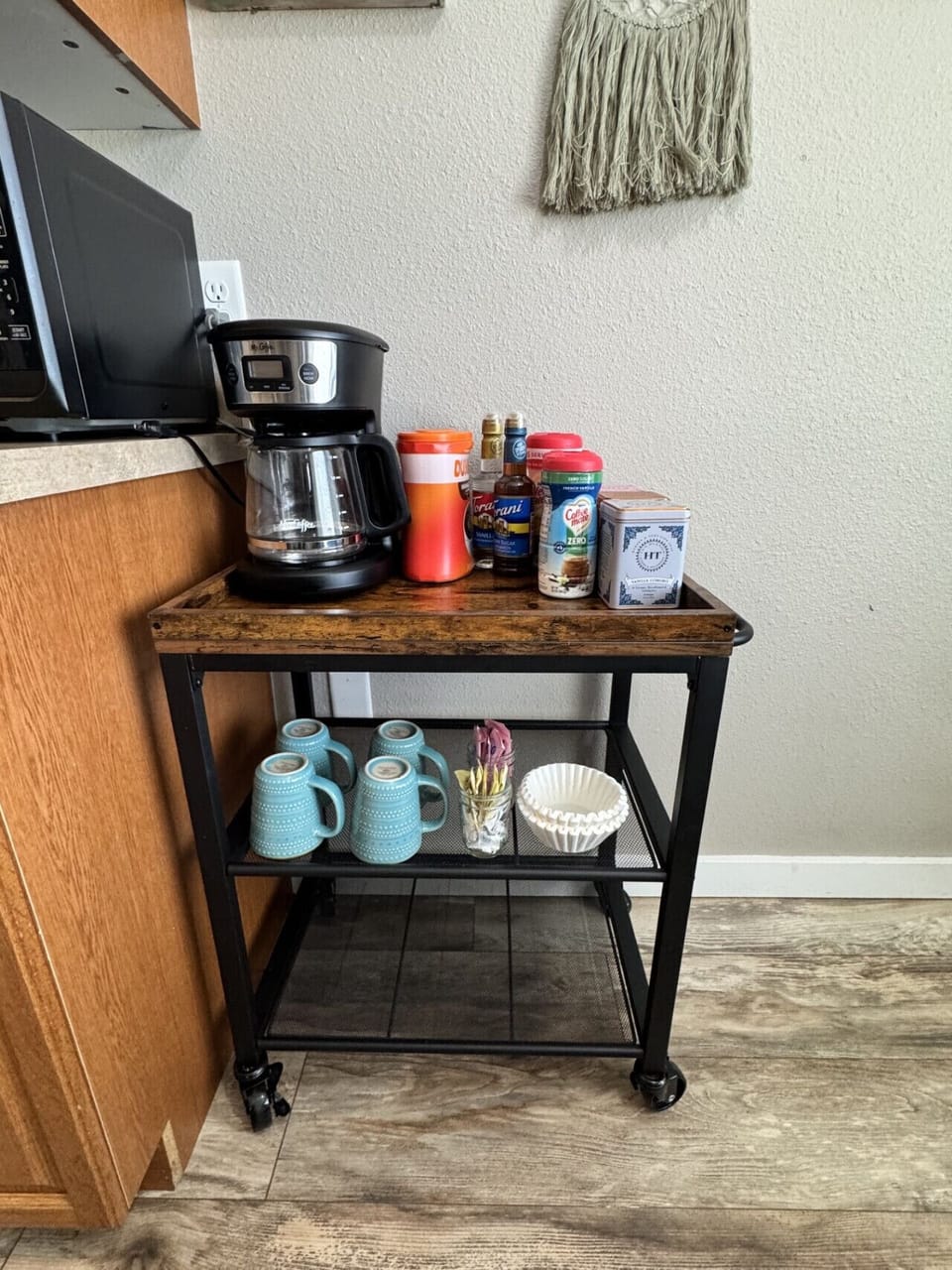 Fully stocked coffee bar - grounds, creamers, and sweeteners provided