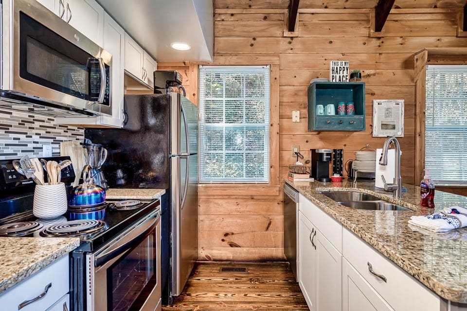 Galley style kitchen is open to the rest of the cabin
