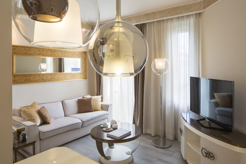 Junior Suite, Kitchenette | Living area | Flat-screen TV, first-run movies