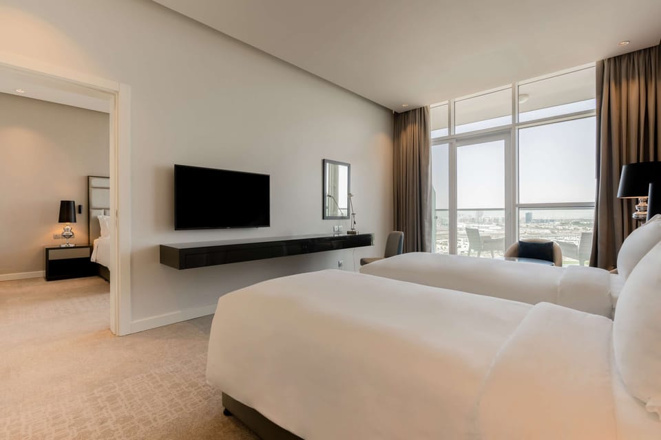 Family Room | Premium bedding, down comforters, minibar, in-room safe