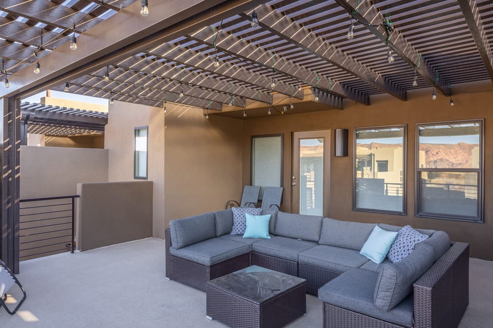 Upstairs Patio Seating Area - Read a book and enjoy the weather while you lounge around in the comfort on the upstairs patio area.