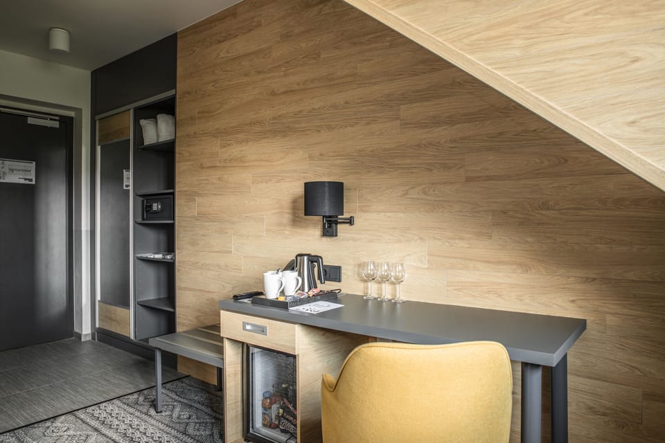 Standard Triple Room, 2 Bedrooms | In-room safe, blackout drapes, free WiFi, bed sheets
