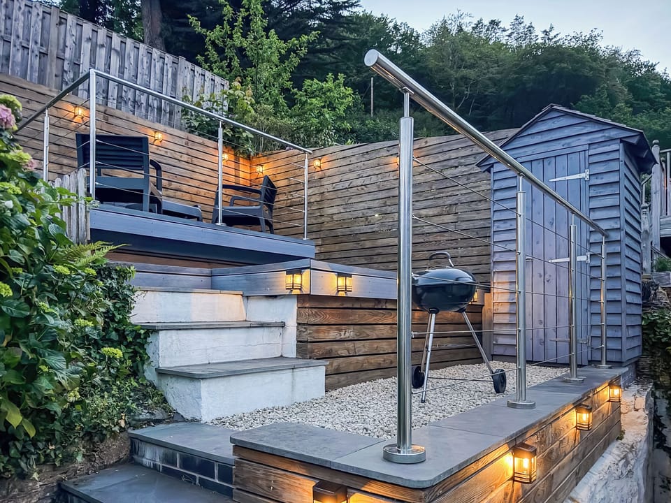 And the decking at night to enjoy a chilled evening | Driftwood, Aberdovey