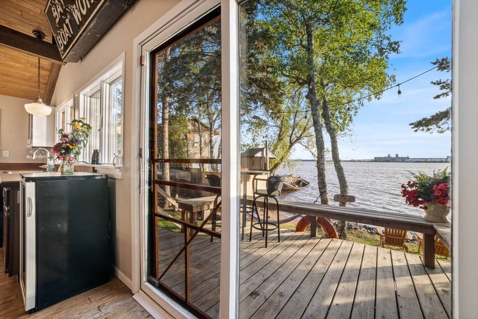 Deck off of the kitchen, only steps to the water!