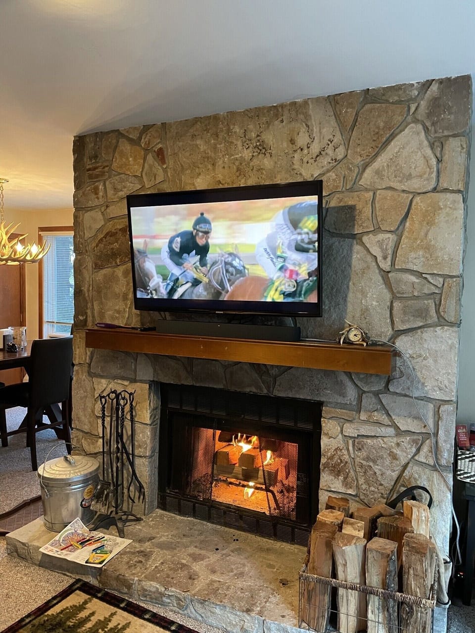 Roku streaming TV with Apple airplay music over our awesome fireplace