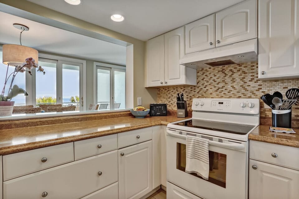 Kitchen fully equipped for your cooking needs with great views of the ocean
