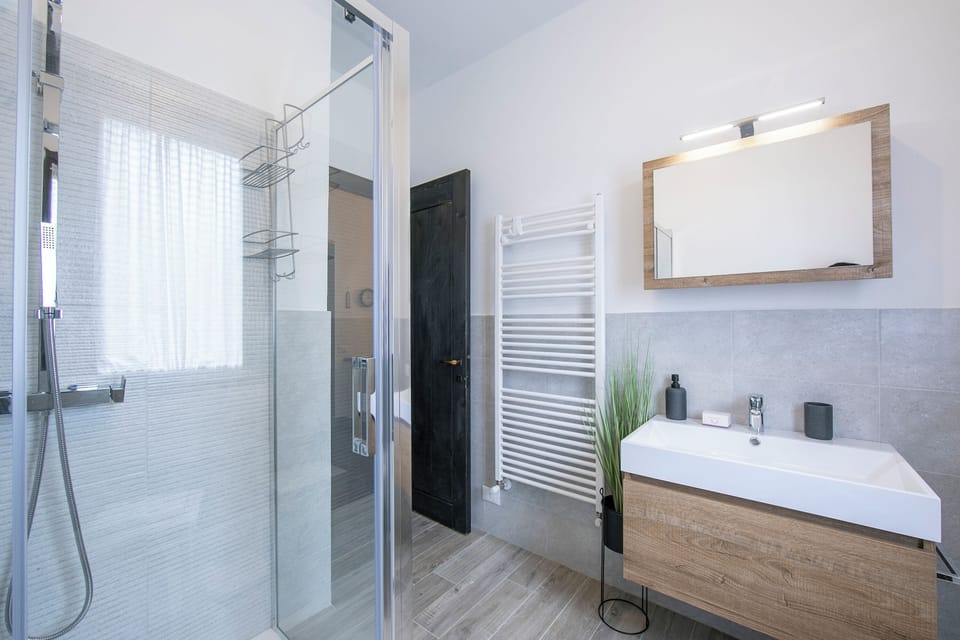 Family Townhome, Multiple Bedrooms, 2 Bathrooms, Mountainside (Residenza La Parusciola Pool and) | Bathroom | Separate tub and shower, hair dryer, bidet, towels