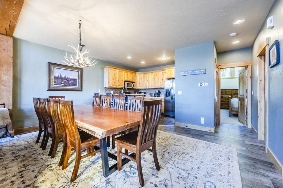 Dining and kitchen - Dining area, conveniently placed between the living area and kitchen with seating for 10.