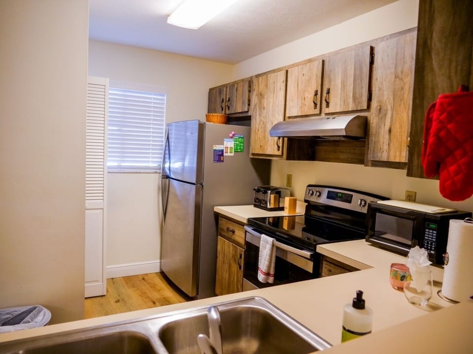 Large Fridge/Freezer, Oven/Stove, Toaster, Coffee Maker, Microwave, Wine Glasses