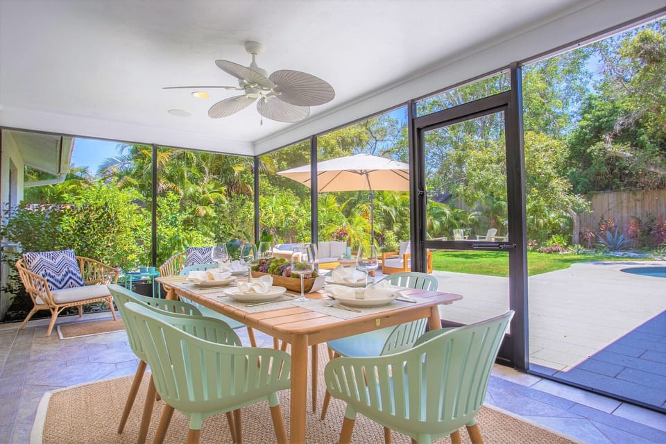 View from the outdoor dining area looking out into the backyard