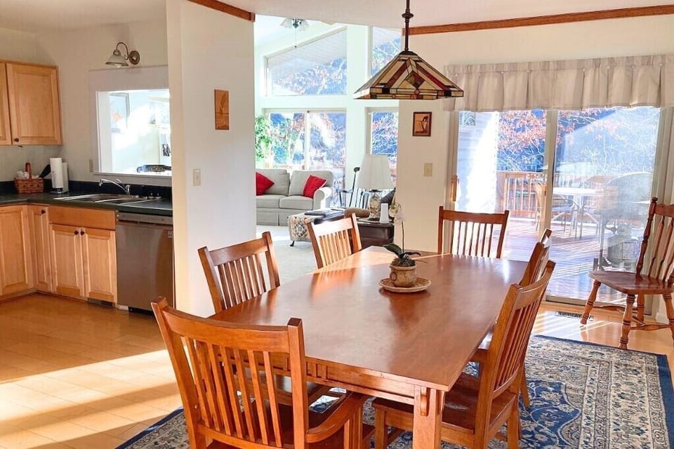 Beware: you could be distracted in this kitchen.  While you're working to make that special dish, the view out of those windows could steal you mind.