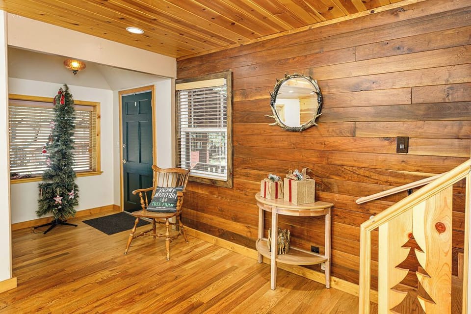 Step through the front door to a spacious living room filled with charm & warmth