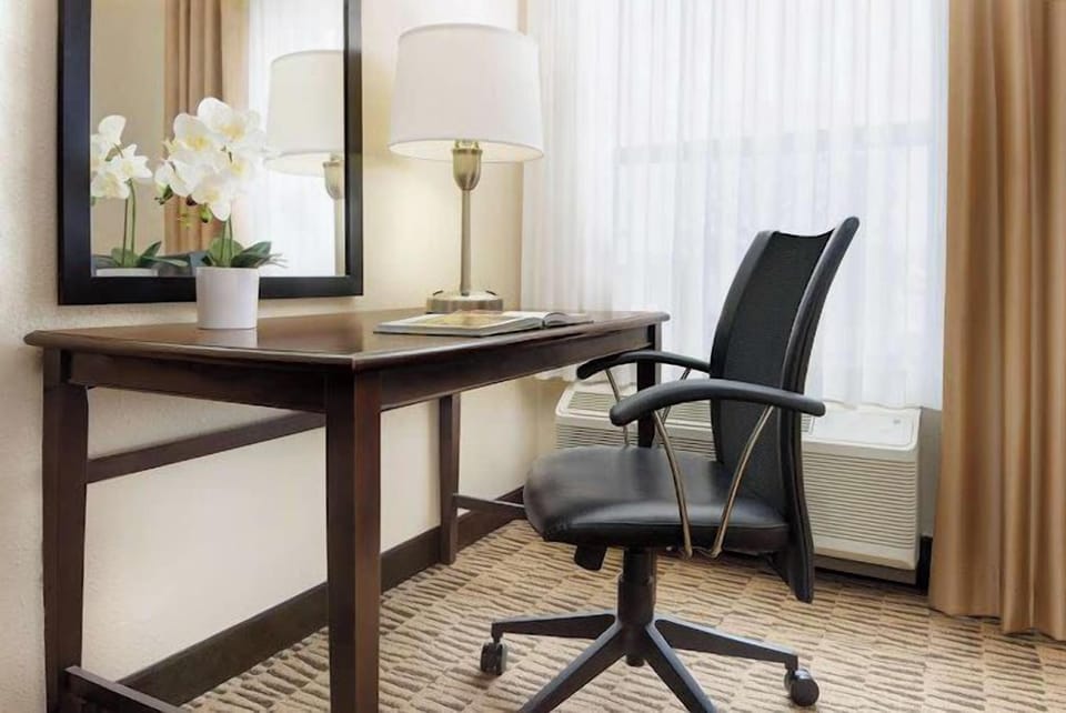 Premium bedding, down comforters, desk, laptop workspace