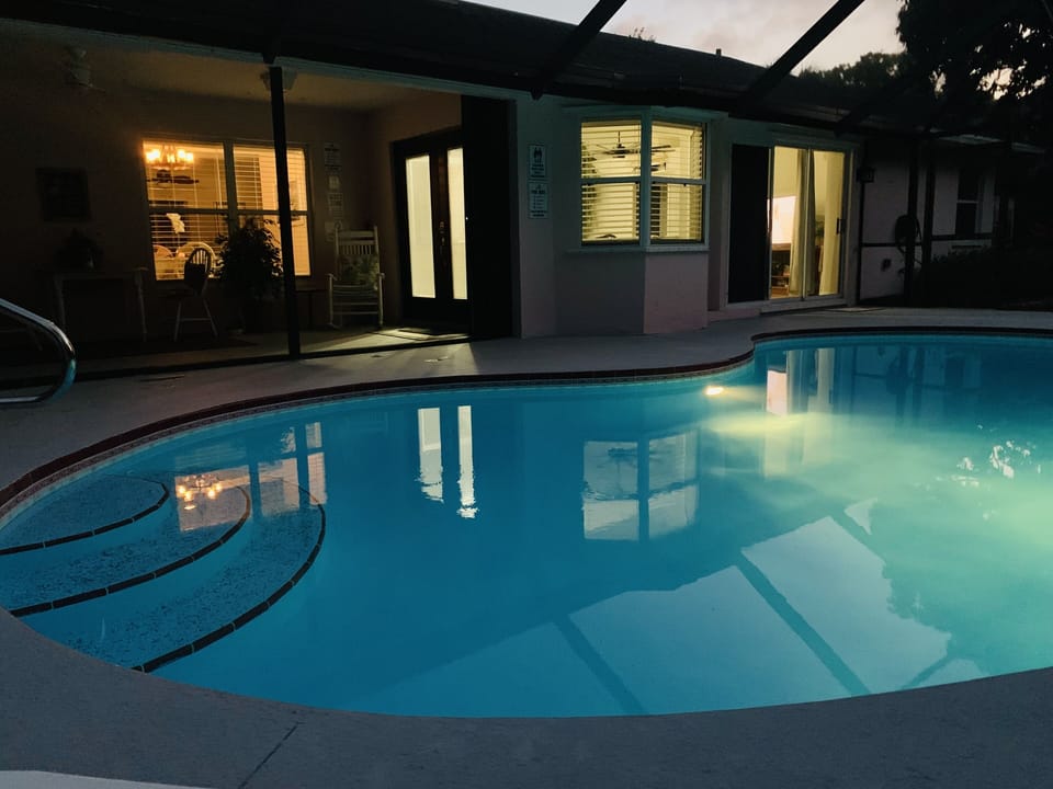 Enjoy dinner and a cocktail on the patio near your own private pool