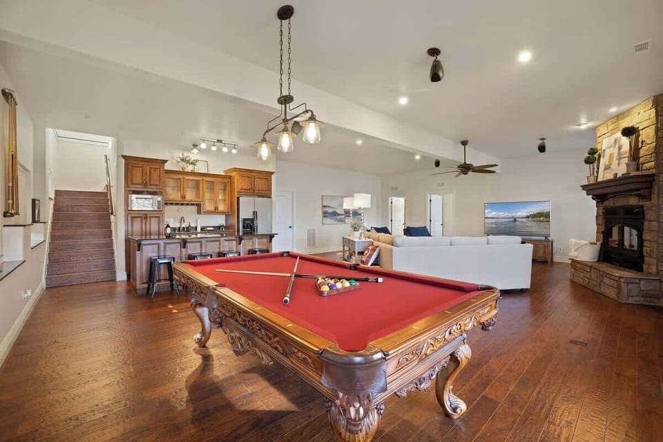 Our secondary living space is complete with a full-size pool table, 75-inch LG Smart TV, and a kitchenette.