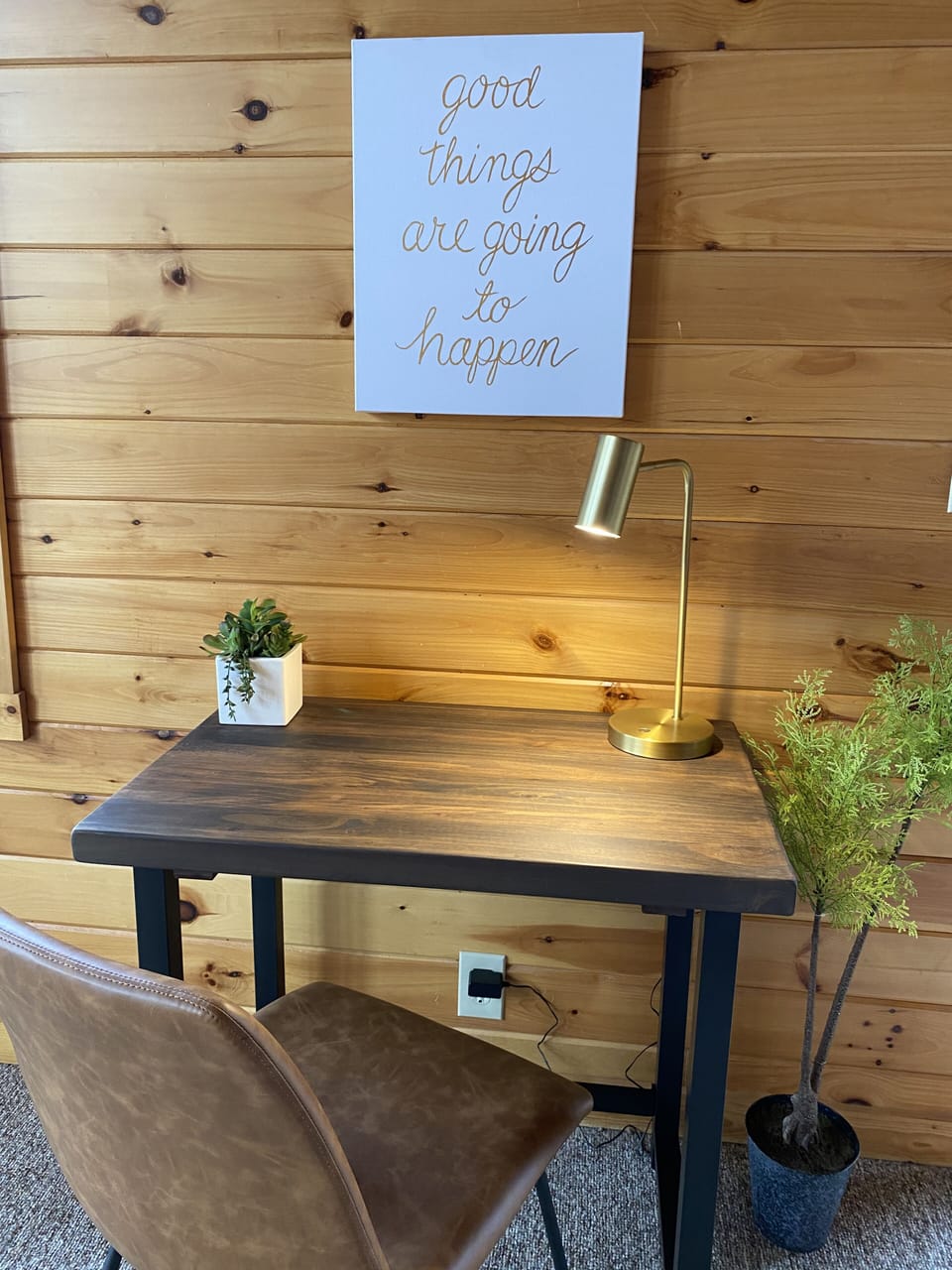 A desk is set up in the loft with lightning fast internet for remote work