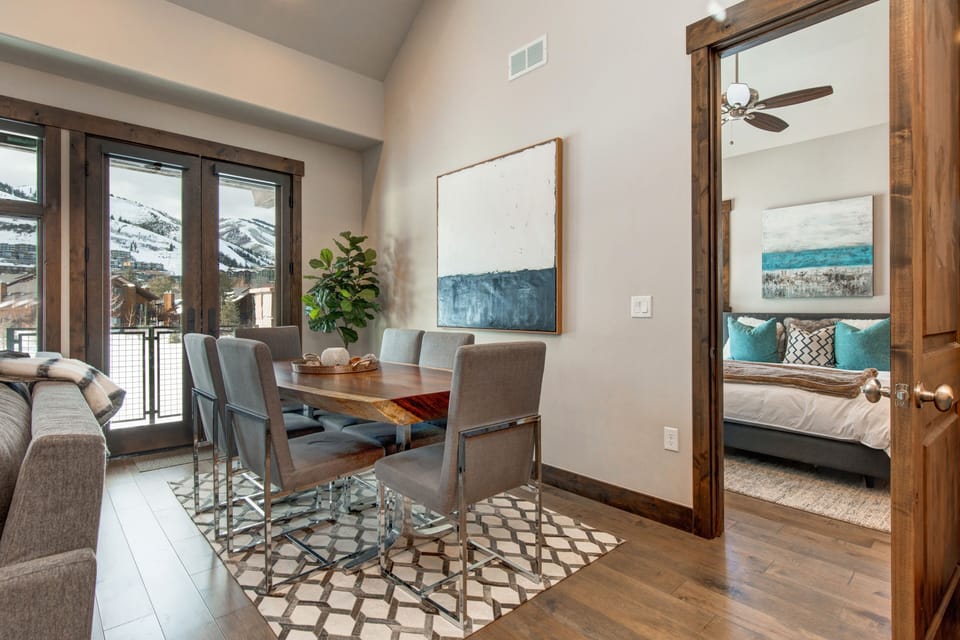 Dining Area with seating for six and double-doors that open up to the 13th hole of Canyons Golf Course