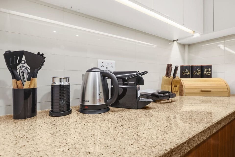 Kitchen Delight: Modern appliances and sleek countertops await your culinary adventures!