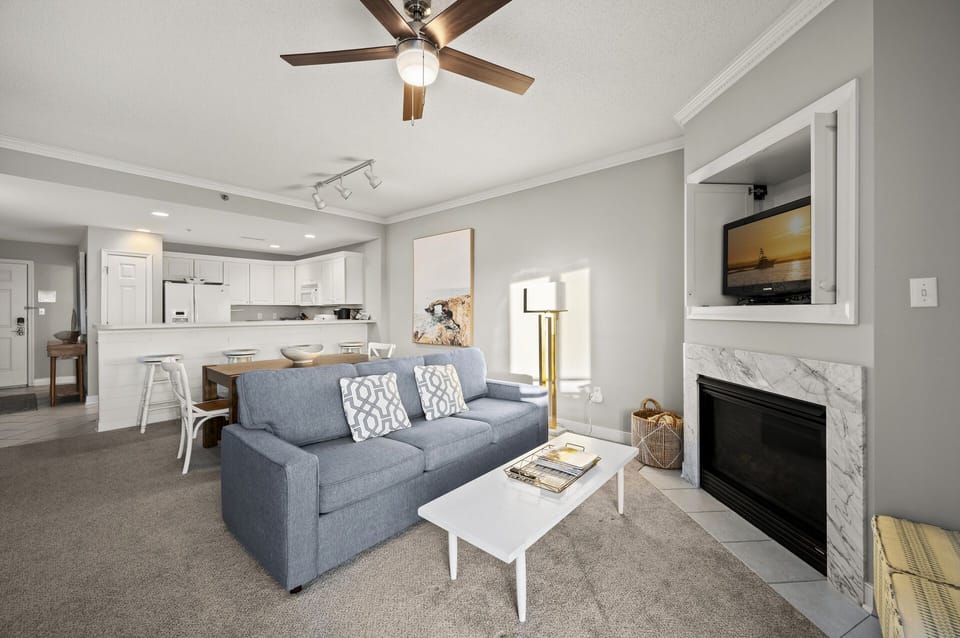 Gorgeous Colors of Sand and Surf. Fireplace is decorative only.