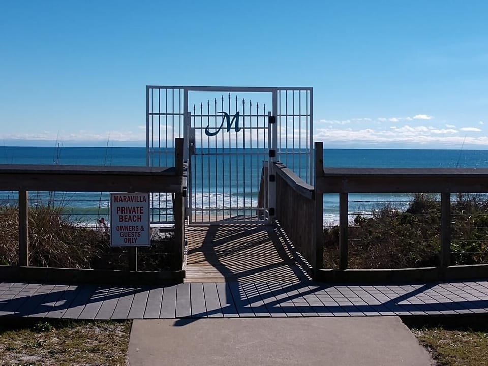 Private Beach Entrance. Love the monogram M for Maravilla.