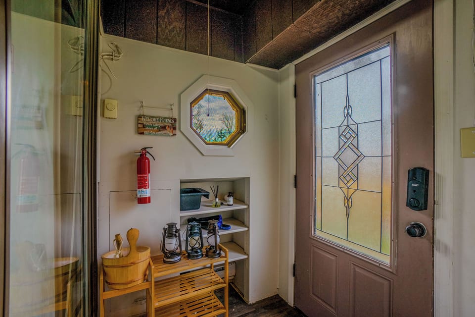 Welcoming entryway with space for shoes and outdoor gear.