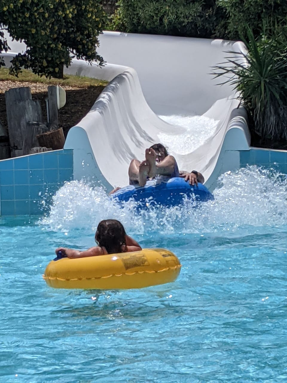 150ft water slide into main outdoor pool makes for a fun time for all!
