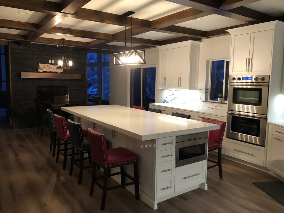 Large accomodating kitchen with fireplace.