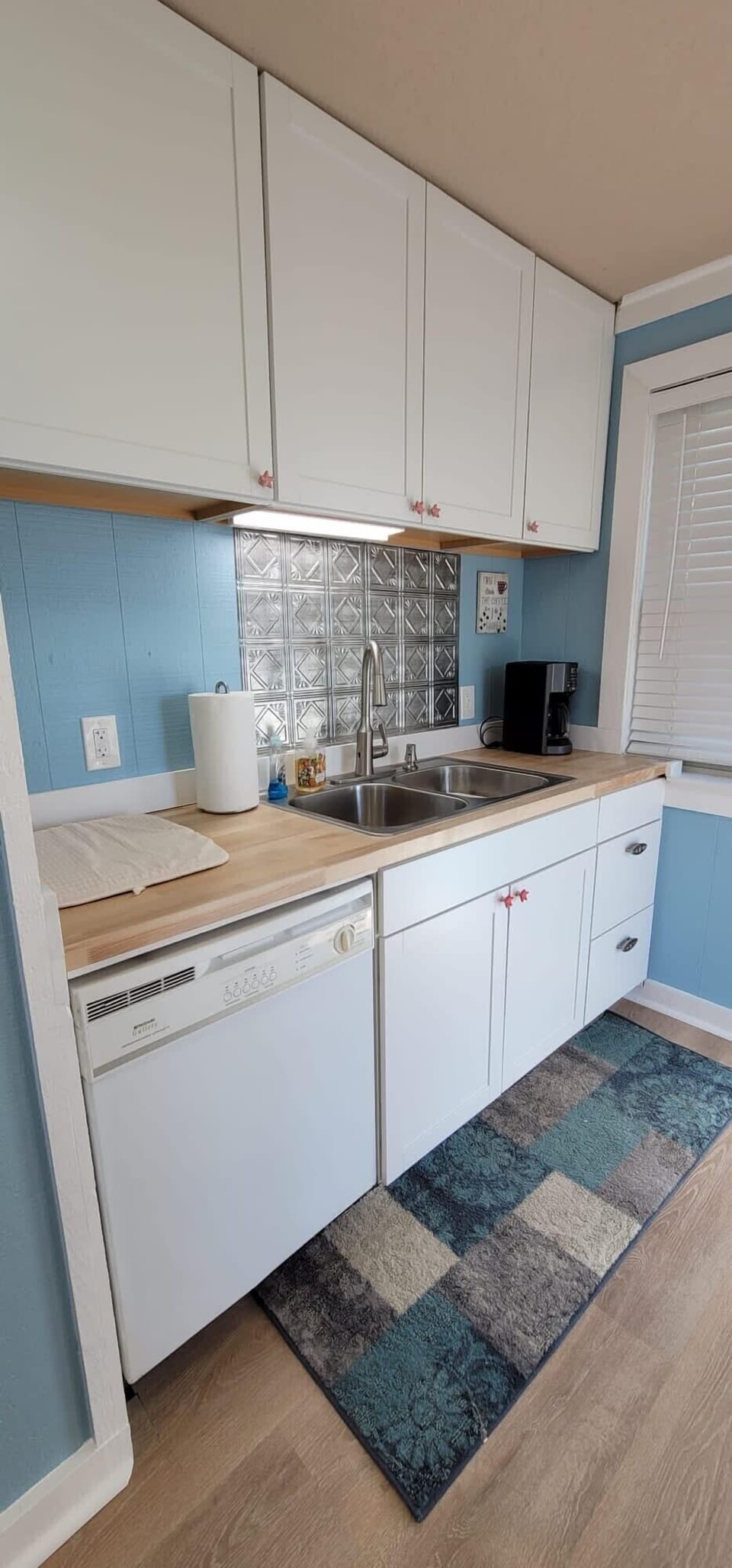 Galley kitchen, fully equipped. Touch free faucet.