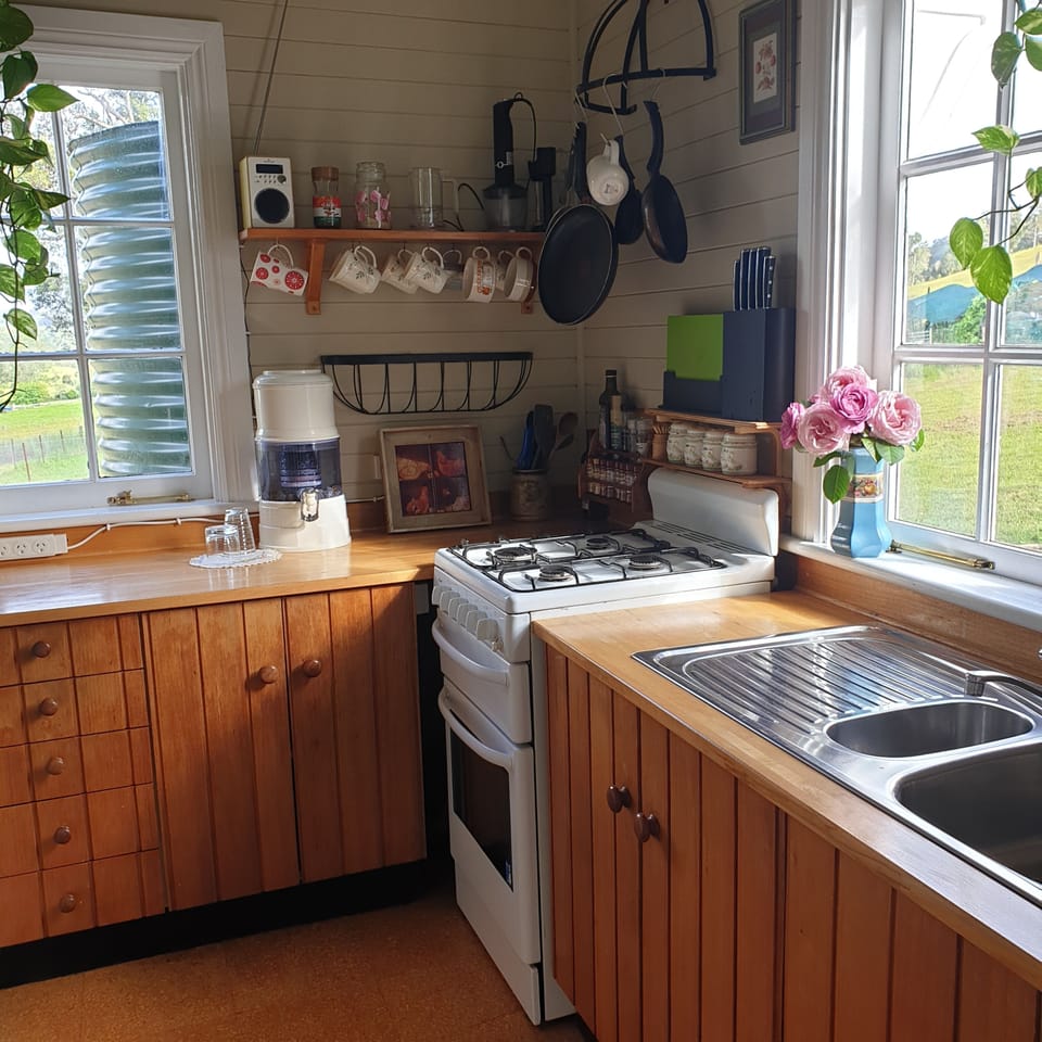 Galley kitchen. gas oven and stove top.