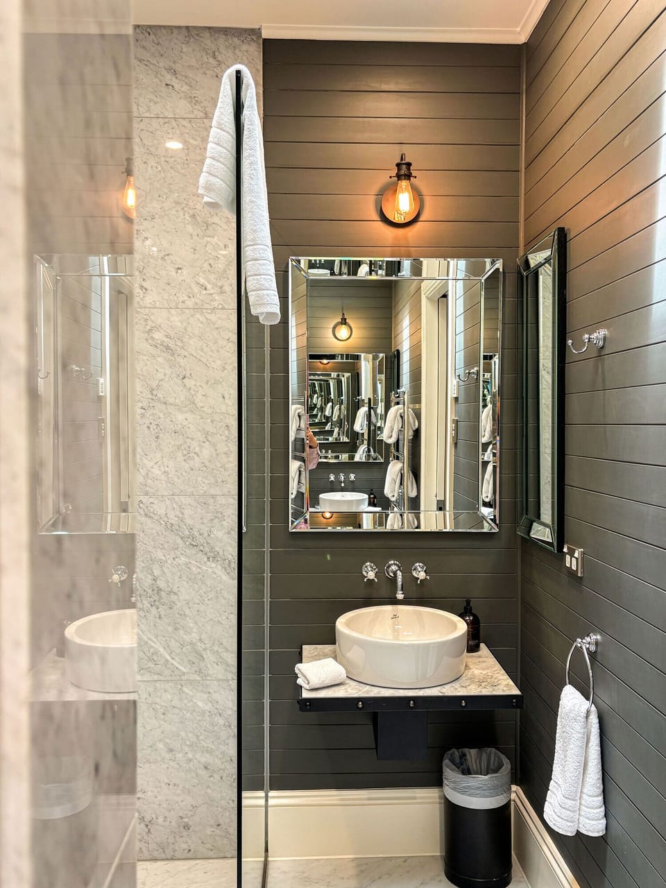 The Gold Vault Suite | Bathroom | Deep soaking tub, rainfall showerhead, designer toiletries, hair dryer