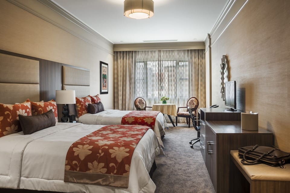 Premium bedding, in-room safe, individually decorated
