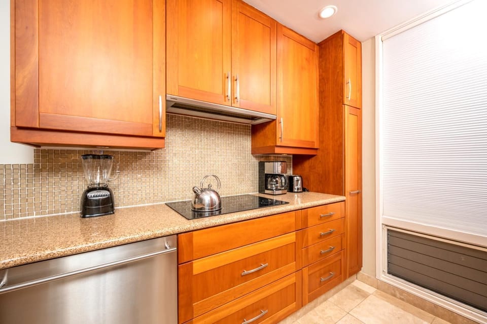   Every kitchen detail—from the toaster to the blender—has a home in this organized and stylish corner