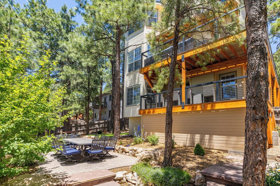 Our new, expanded deck and remodeled backyard with 10 person table. 