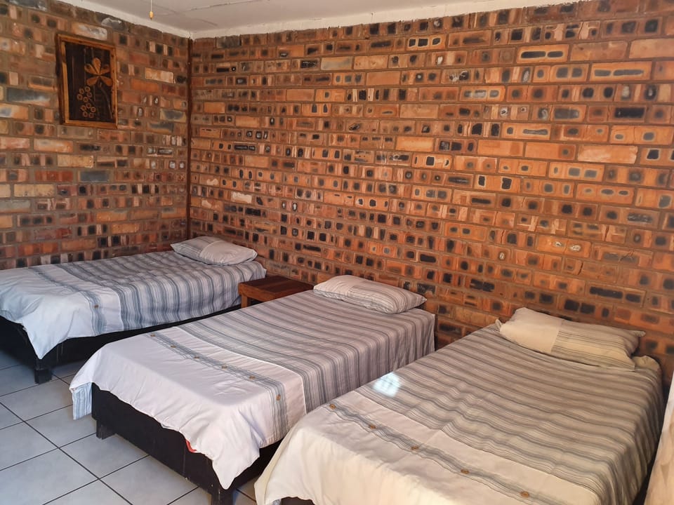 Room (Self-Catering) | Rollaway beds, WiFi (free), bed sheets
