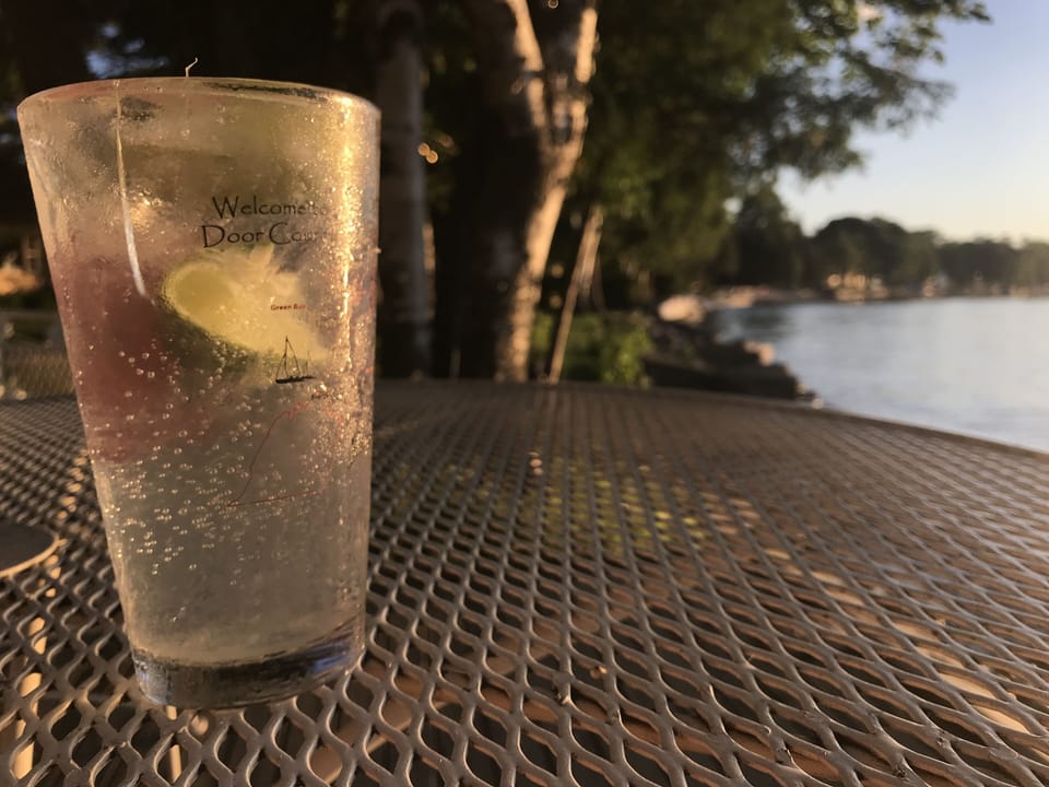 Cooling drinks on the shorefront deck.  Views and privacy can't be beat!