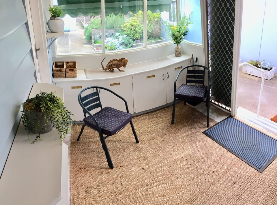 Sunroom, Quiet Spot for a Coffee overlooking the Back Yard and Garden.