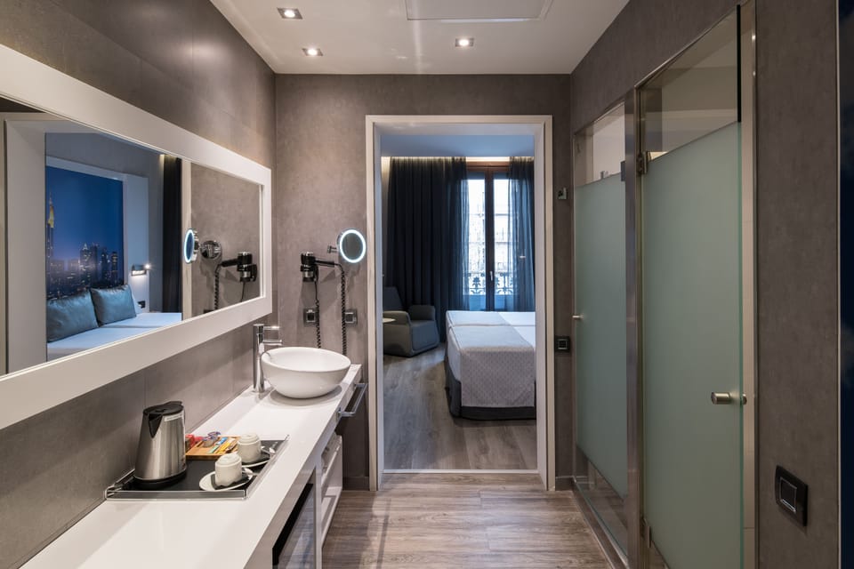 Shower, eco-friendly toiletries, hair dryer, towels