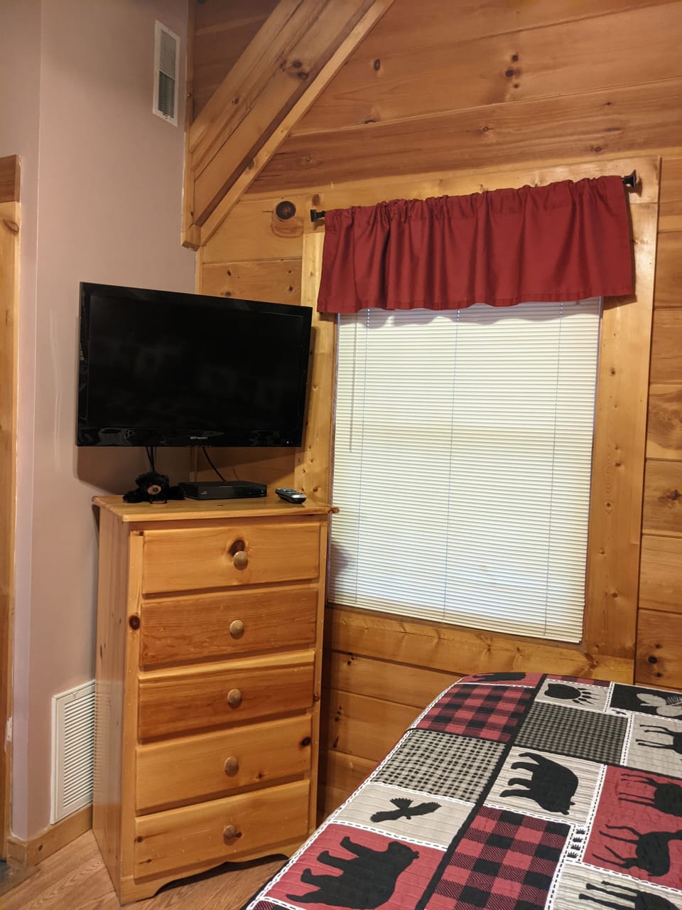 42" Smart TV with cable, 5 drawer dresser for clothes storage, and closet!